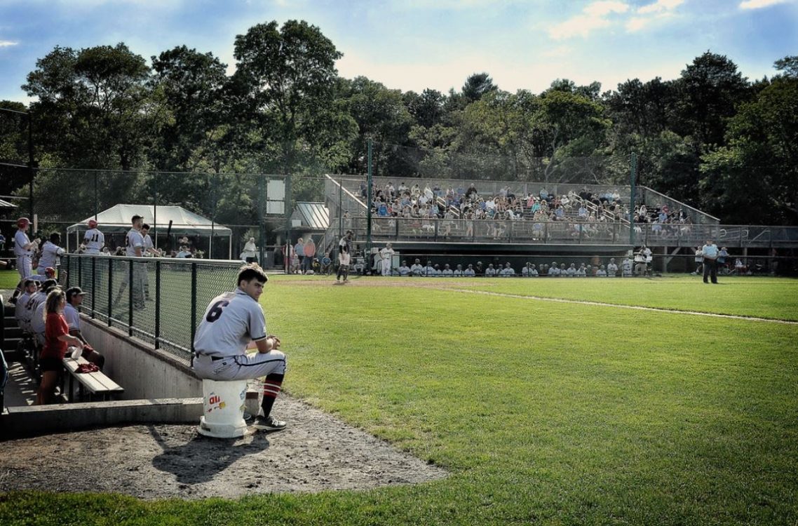 Photo of the Cotuit Kettleers baseball game from the first baseline. 
